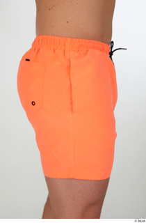 Joel dressed hips orange shorts sports 0007.jpg